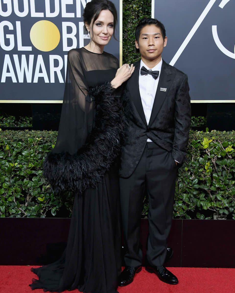 Angelina walked the Golden Globes red carpet with her son Pax Jolie-Pitt. Source: Getty