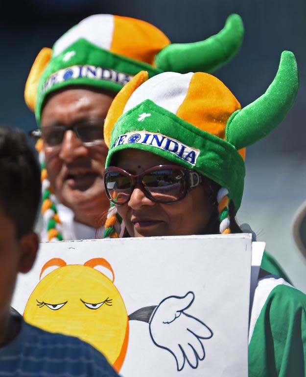 Fans watch the Cricket World Cup Pool B match between the United Arab Emirates and India, in Perth, on February 28, 2015