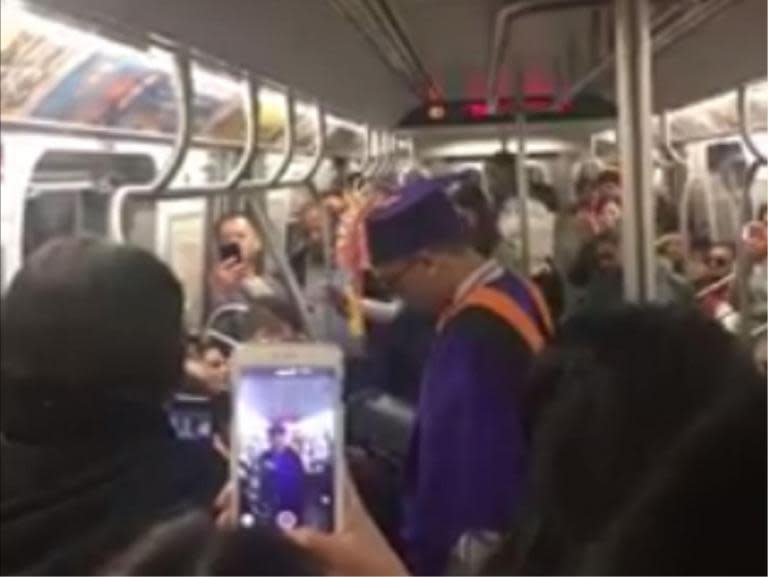 New Yorkers stage graduation ceremony for student stuck on delayed train