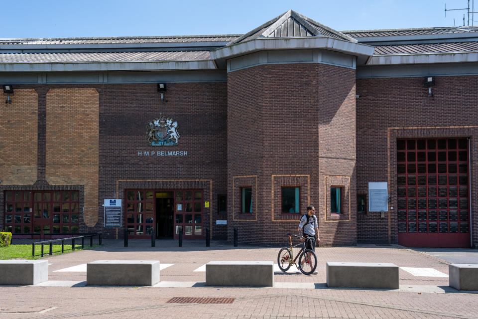 LONDON, ENGLAND - MAY 20: A man pushes his bike past HMP Belmarsh where Julian Assange has been held since 2019, on May 20, 2024 in London, England. Julian Assange has been held at London's Belmarsh Prison for five years of imprisonment without being convicted. The WikiLeaks founder is facing life imprisonment in the U.S. for publishing thousands of classified military and diplomatic documents in 2010, which U.S. Army whistleblower Chelsea Manning provided. (Photo by Carl Court/Getty Images)