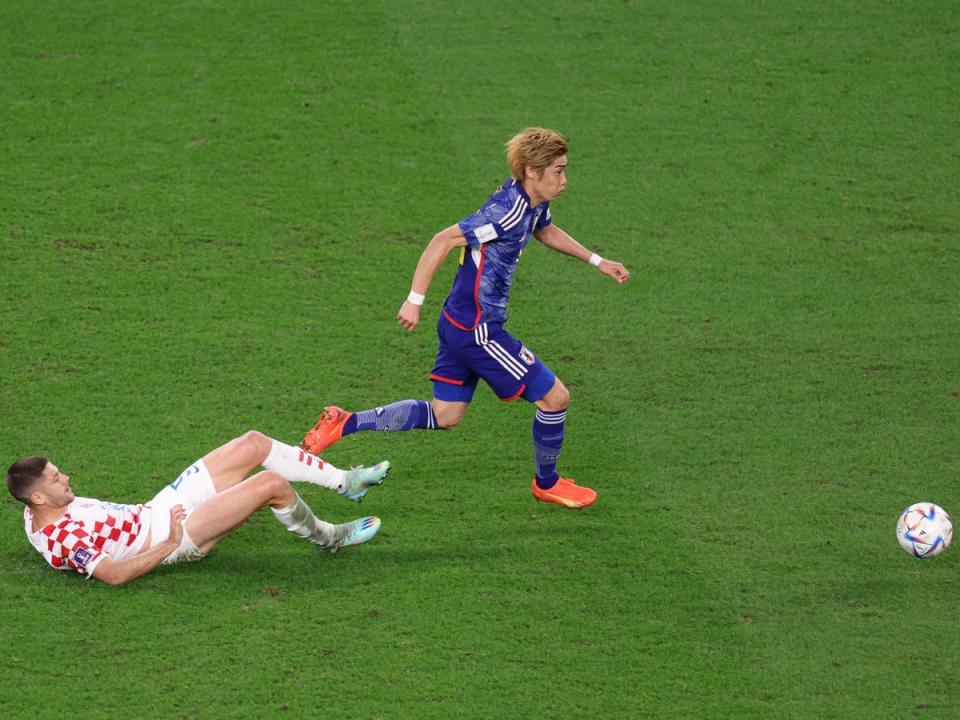 Junya Ito leaves behind Andrej Kramaric in Japan’s clash with Croatia (Getty Images)