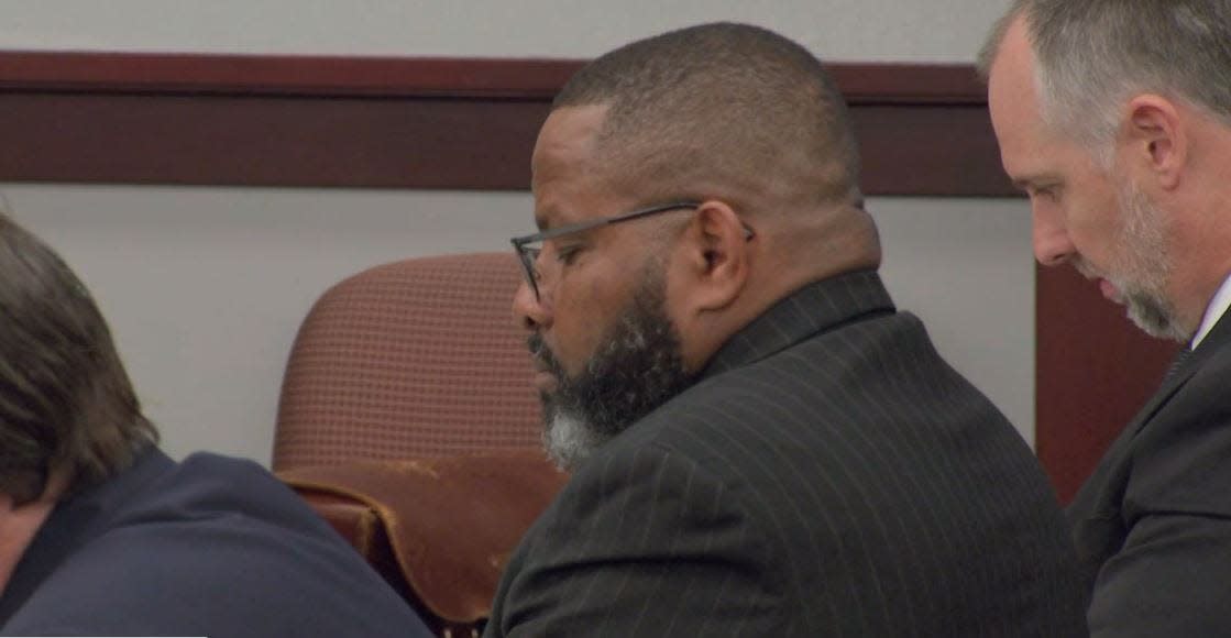 Former Clay County Sheriff Darryl Daniels listens as audio from his FDLE interview is played in court Wednesday.