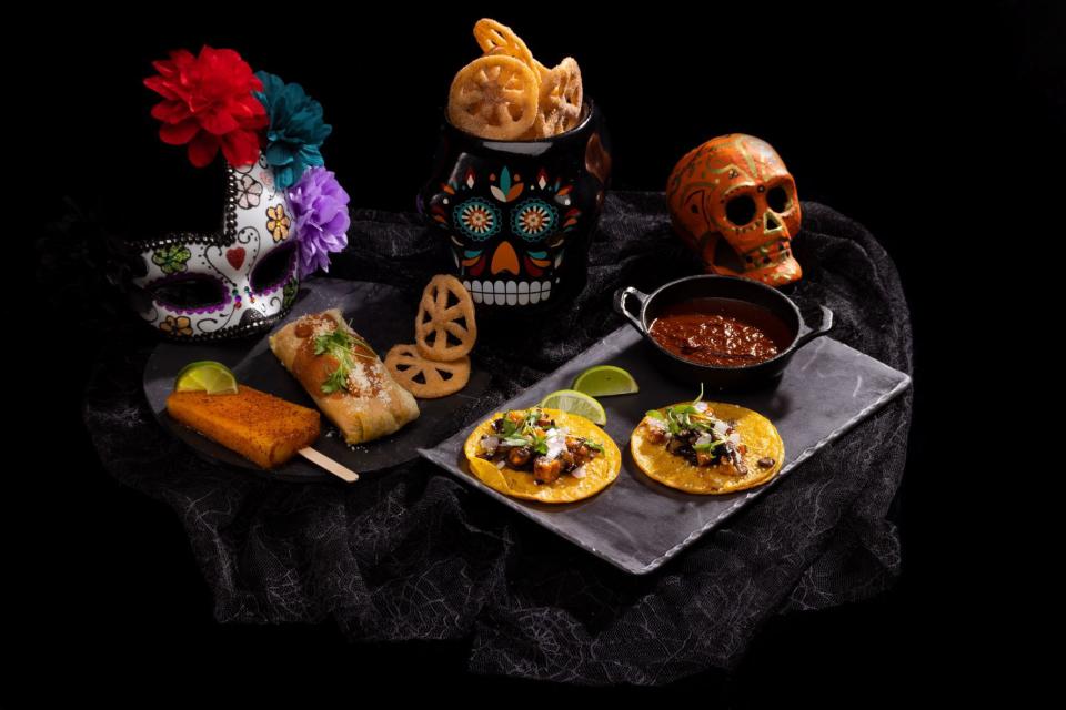 Día de los Muertos themed items: Includes offerings inspired by Latin flavors.