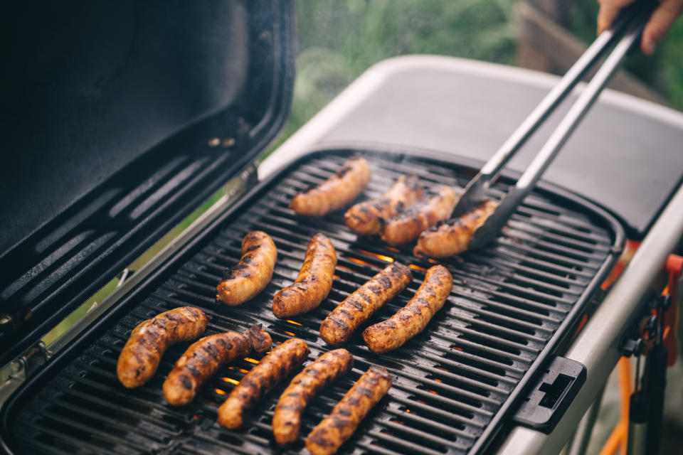 Hot dogs on a grill