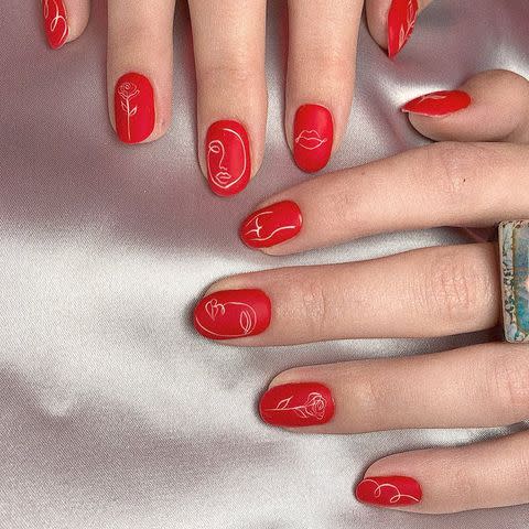 <p>A matte red manicure looks way cooler with the addition of abstract silhouettes. </p><p><a href="https://www.instagram.com/p/B4FQT5RqLyZ/" rel="nofollow noopener" target="_blank" data-ylk="slk:See the original post on Instagram;elm:context_link;itc:0;sec:content-canvas" class="link ">See the original post on Instagram</a></p>