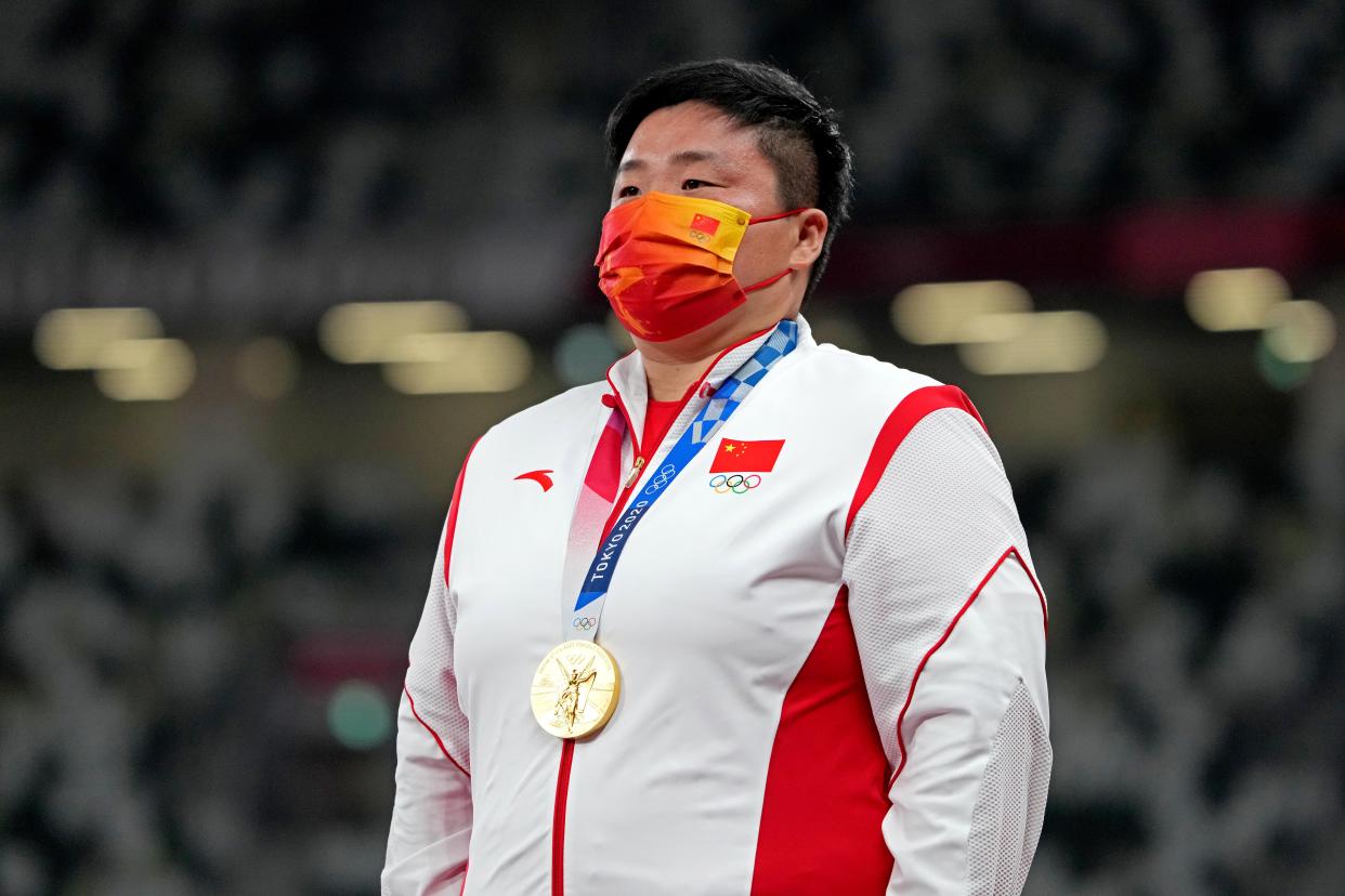 Aug 1, 2021; Tokyo, Japan; Lijiao Gong (CHN) celebrates winning the gold medal in the women's shot put during the Tokyo 2020 Olympic Summer Games at Olympic Stadium. Mandatory Credit: Kirby Lee/USA TODAY Sports/Sipa USA