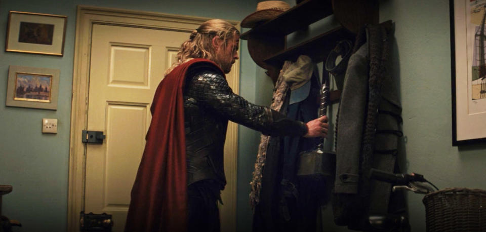 entering Jane's apartment, Thor politely hangs his hammer on the coat rack