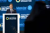 South Korean President Moon Jae-in speaks during Abu Dhabi Sustainability Week at Dubai Expo 2020 in Dubai, United Arab Emirates, Monday, Jan. 17, 2022. The president of South Korea on Monday vowed to world leaders that his fossil fuel-dependent country and the oil-rich United Arab Emirates would jointly expand their investments in renewable energy to tackle climate change. (AP Photo/Jon Gambrell)