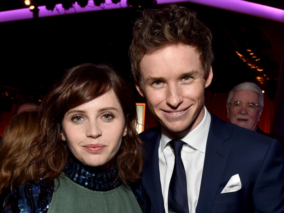 BEVERLY HILLS, CA - FEBRUARY 02:  Actors Felicity Jones (L) and Eddie Redmayne attend the 87th Annual Academy Awards Nominee Luncheon at The Beverly Hilton Hotel on February 2, 2015 in Beverly Hills, California.  (Photo by Kevin Winter/Getty Images)