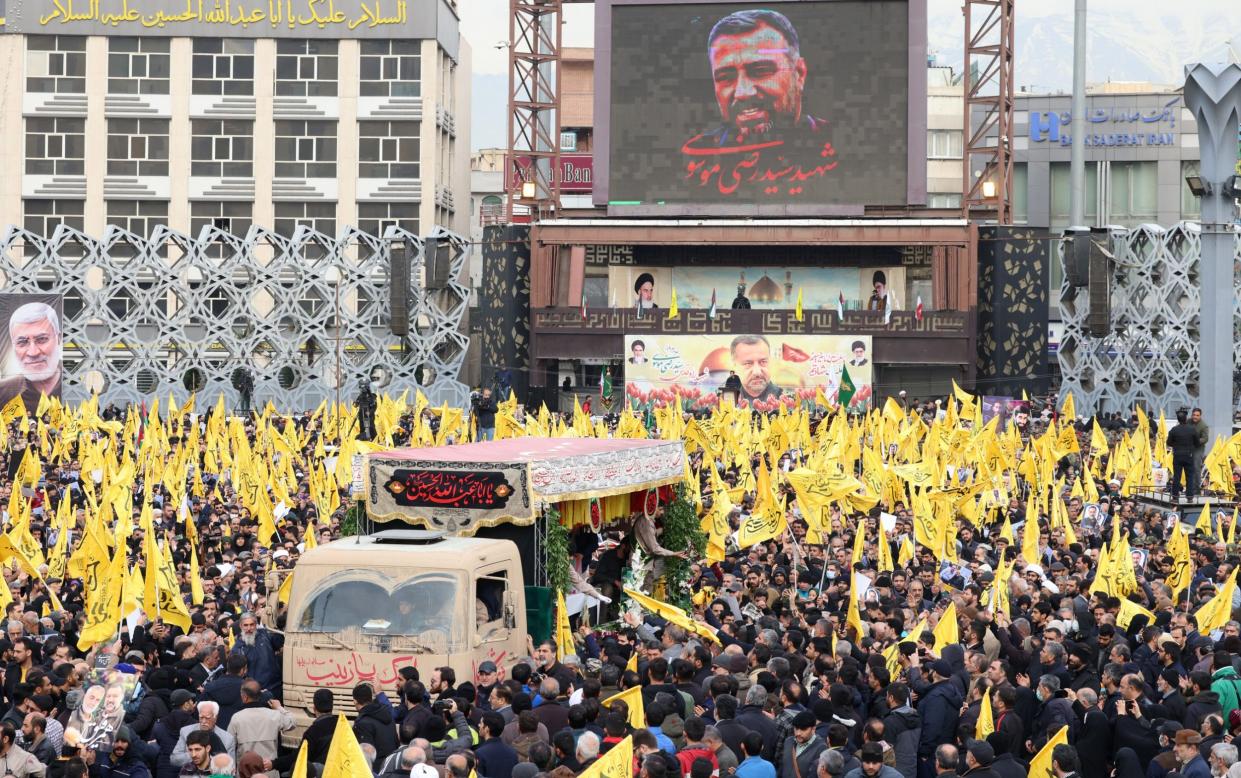 Thousands attend the funeral of senior Revolutionary Guards commander Razi Moussavi in Tehran