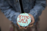 <p>A girl hands out cupcakes at a protest against the announcement that the Trump administration is ending the Deferred Action for Childhood Arrivals program, known as DACA, in Minneapolis, Tuesday, Sept. 5, 2017. (Photo: Renee Jones Schneider/Star Tribune via AP) </p>