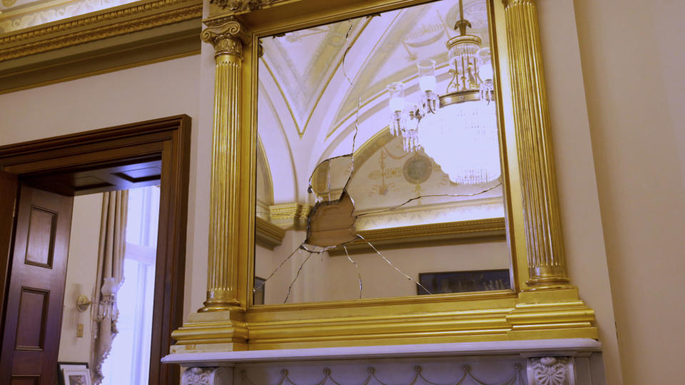 In an image provided by CBS News and "60 Minutes," a mirror is seen damaged in the private office of House Speaker Nancy Pelosi, D-California, Friday, Jan. 8, 2021, at the U.S. Capitol, in Washington. In an interview that aired Sunday, Jan. 10 on "60 Minutes," Pelosi talked about her experience during the insurrection at the Capitol on Wednesday, Jan. 6. (60 Minutes/CBSNews via AP)