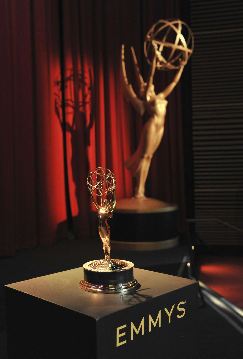 Emmy statuette and statue appear on stage prior to the start of the 71st Primetime Emmy Nominations Announcements at the Television Academy's Saban Media Center on Tuesday, July 16, 2019, in Los Angeles. (Photo by Richard Shotwell/Invision/AP)