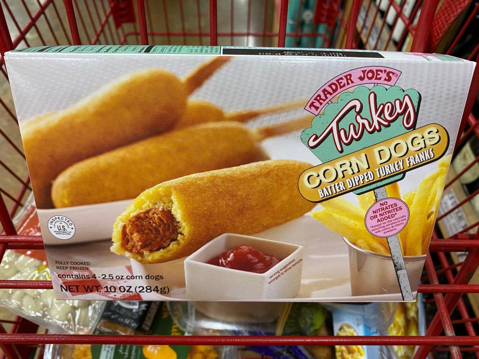 Trader Joe's turkey corn dogs in original box in red cart