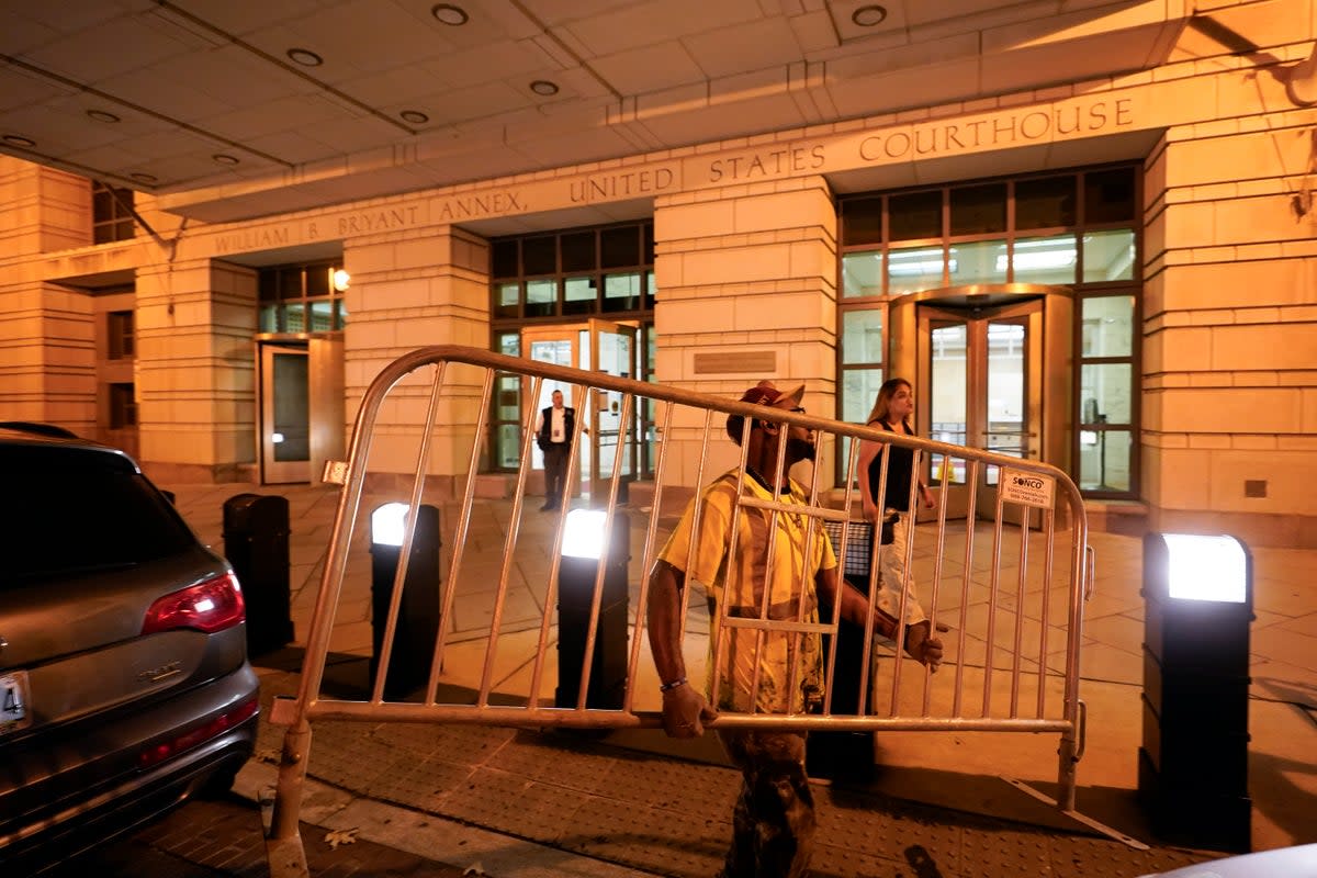 Workers put up barricades outside the E. Barrett Prettyman U.S. Federal Courthouse on Wednesday (Copyright 2023 The Associated Press. All rights reserved.)