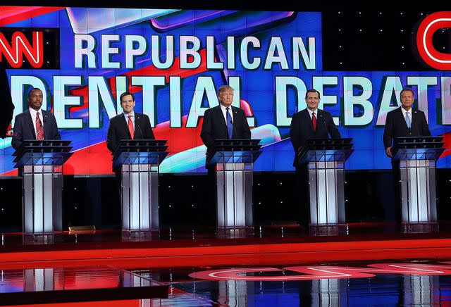 <p>Joe Raedle/Getty</p> Ben Carson, Marco Rubio, Donald Trump,Ted Cruz and John Kasich stand on stage for the Republican National Committee Presidential Primary Debate in 2016