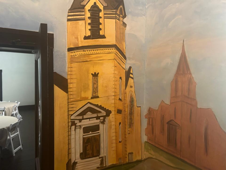 A wall painting in His Place depicts the former Bridgewater United Methodist Church.