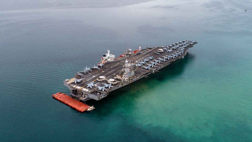 The American aircraft carrier USS Gerald R. Ford is seen from the air anchored in Italy in the Gulf of Trieste on September 18, 2023. - Andrej Tarfila/SOPA Images/LightRocket/Getty Images