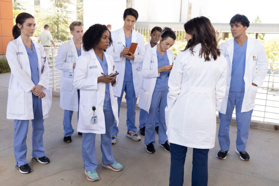 Interns in scrubs