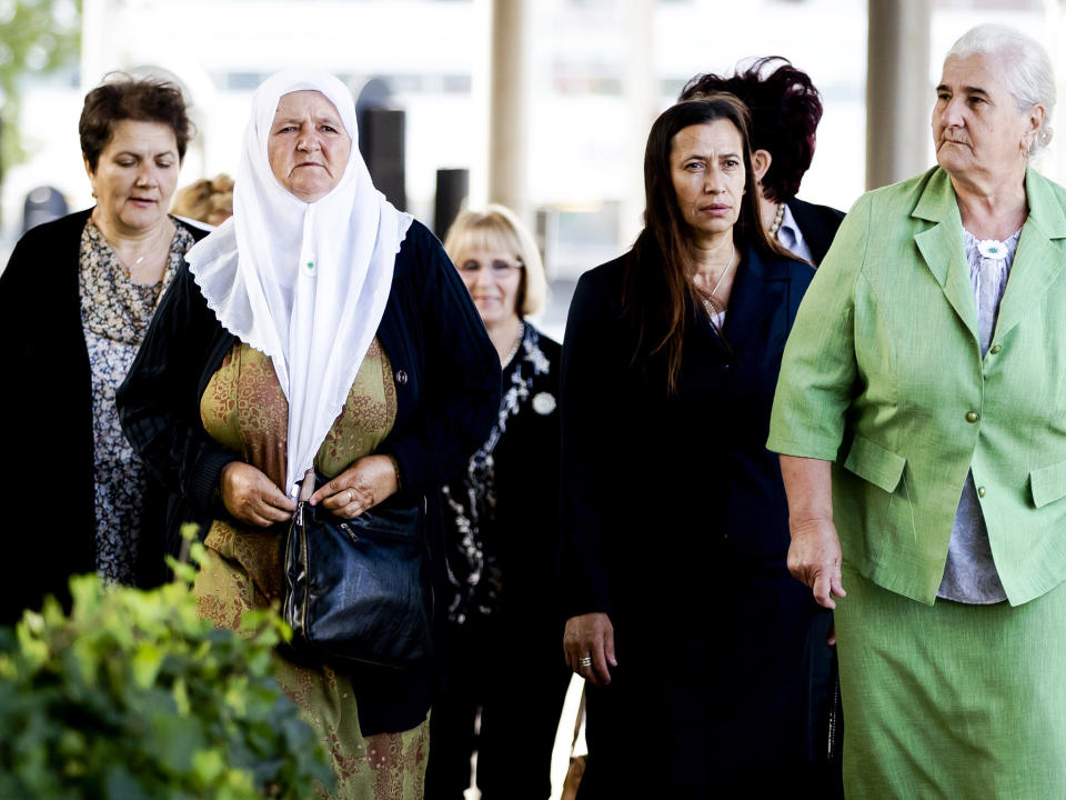 Bosnian women from the Srebrenica Mothers Association arrive at the Court of Justice in The Hague on Tuesday for the verdict of the appeal against the Dutch state: AFP/Getty