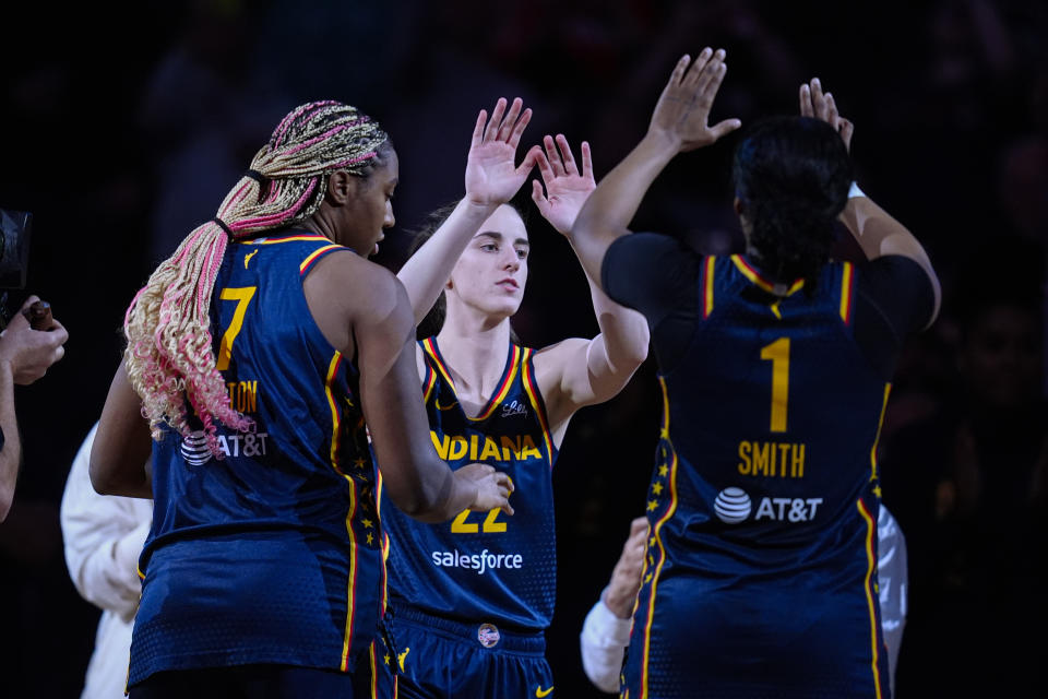 Indiana Fever guard Caitlin Clark (22) is introduced before the team's preseason WNBA basketball game against the Atlanta Dream in Indianapolis, Thursday, May 9, 2024. (AP Photo/Darron Cummings)