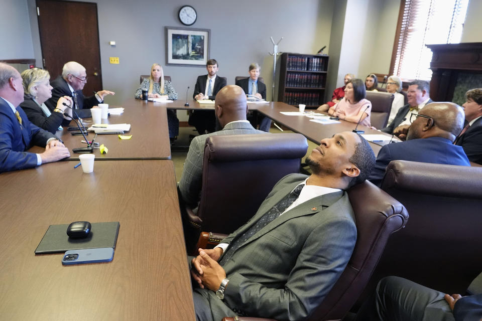 Mississippi State Sen. Bradford Blackmon, D-Canton, foreground, listens as the legislative Medicaid conference committee presents their versions of the state Medicaid expansion plan during a public joint House-Senate Medicaid meeting at the State Capitol, Tuesday, April 23, 2024, in Jackson, Miss. (AP Photo/Rogelio V. Solis)