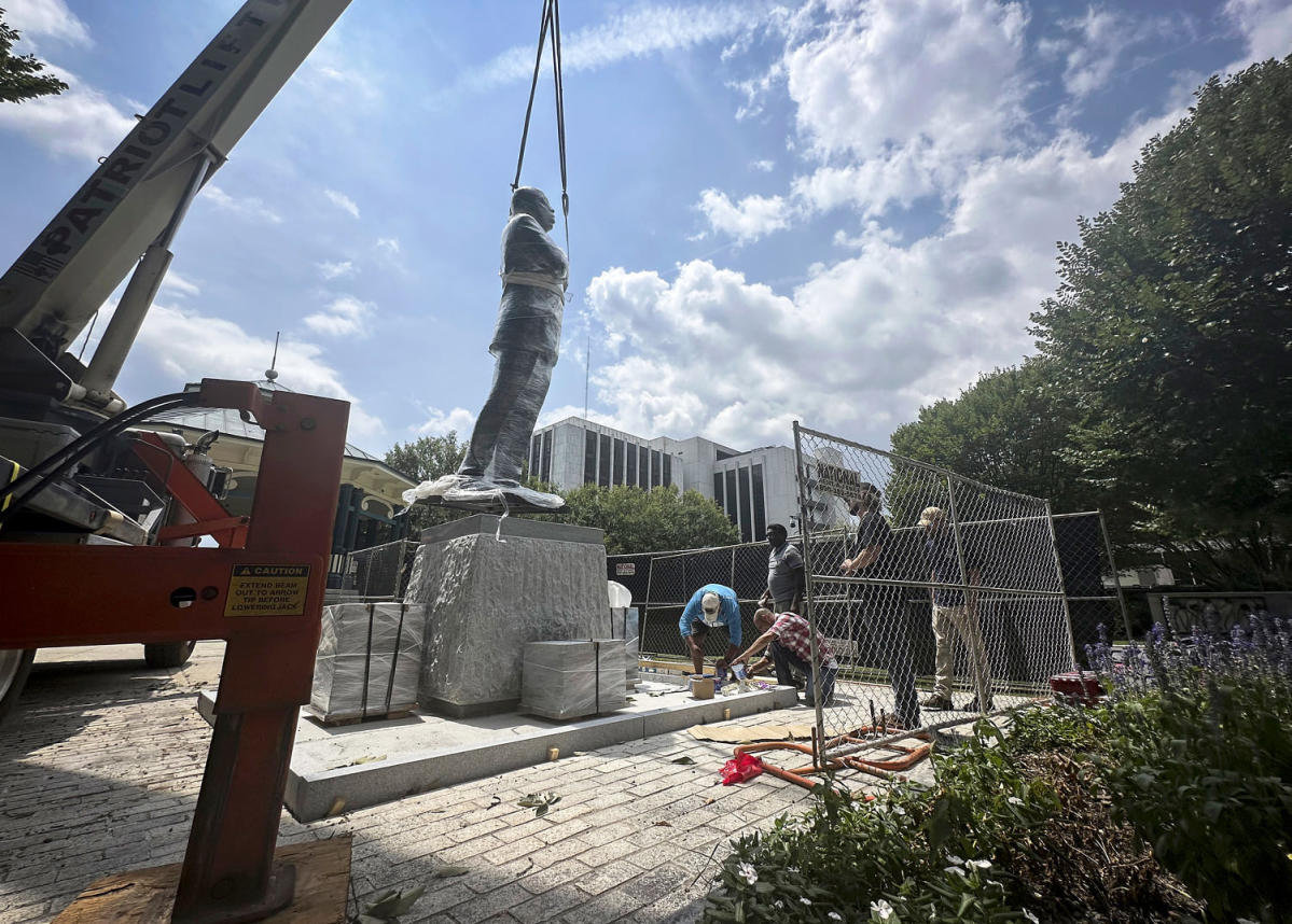 A 12-foot-tall statue of Representative John Lewis stands where the Confederate Memorial once stood