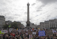 People take part in a 'We Do Not Consent' rally at Trafalgar Square, organised by Stop New Normal, to protest against coronavirus restrictions, in London, Saturday, Sept. 26, 2020. (AP Photo/Frank Augstein)