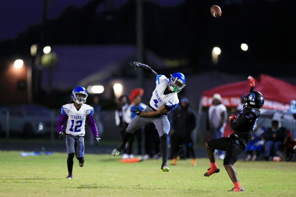 Riverside's Jamal Harvey-Jackson (4) breaks up a pass against Ribault during a November game.