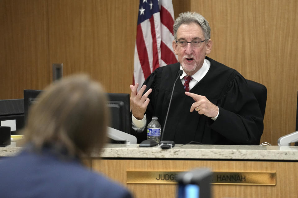 Maricopa County Superior Court Judge John Hannah, right, speaks during closing arguments by attorney Bryan Blehm, representing Kari Lake, former Arizona Republican candidate for governor, during the second day of the two-day bench trial regarding a voting records request, Monday, Sept. 25, 2023, in Phoenix. (AP Photo/Ross D. Franklin, Pool)