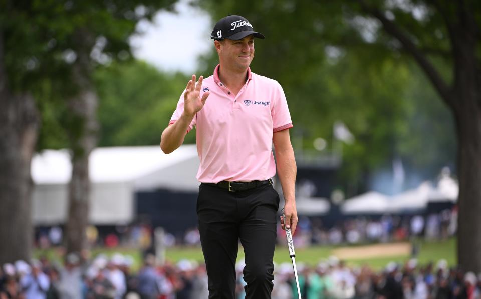 Justin Thomas acknowledges the crowd after making a putt on the sixth green during the final round of the PGA Championship.