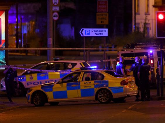 Police cordon off the area near Manchester arena after it was bombed during an Ariana Grande concert in 2017 (AFP/Getty)