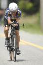 FILE - In this Tuesday, August 9, 2011 file picture, Carl Grove trains on an Elkhart County road near Bristol, In.. USA, in preparation for his return trip to the age-group world championships in Austria. The U.S. Anti-Doping Agency informed Grove that traces of trenbolone, an anabolic steroid used by U.S. cattle farmers to bulk up livestock, were detected in a urine sample he gave at the U.S. Masters Track National Championships in Trexlertown, PA., in July 2018, where the field’s oldest competitor again added to his collection of titles, setting times faster than men in their eighties, seventies and even sixties. (AP Photo/Elkhart Truth, J. Tyler Klassen, File)