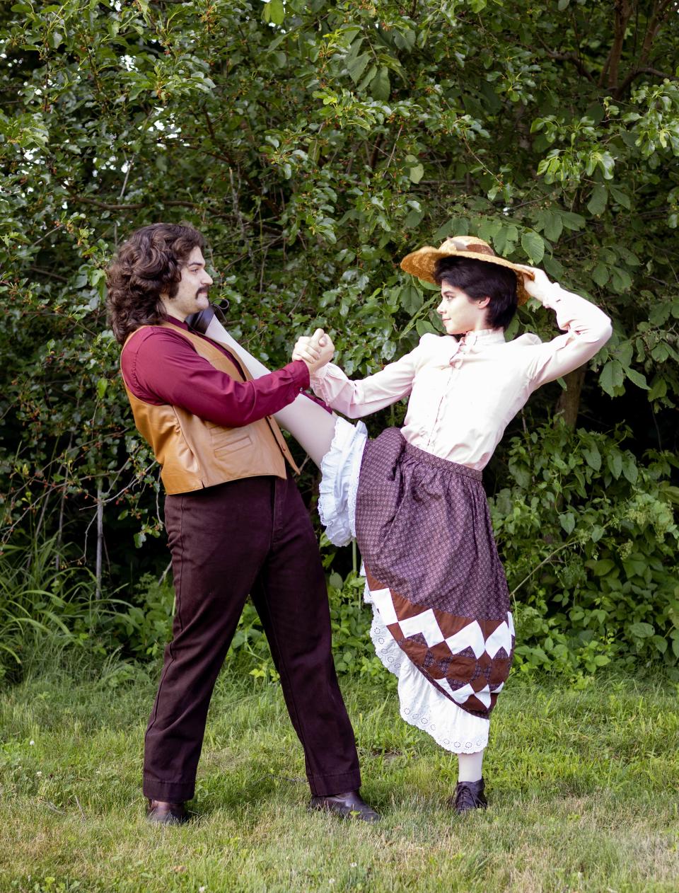 Quint Paxton as Adam and Nora DeGreen as Milly in Weathervane Playhouse’s production of “Seven Brides for Seven Brothers.”