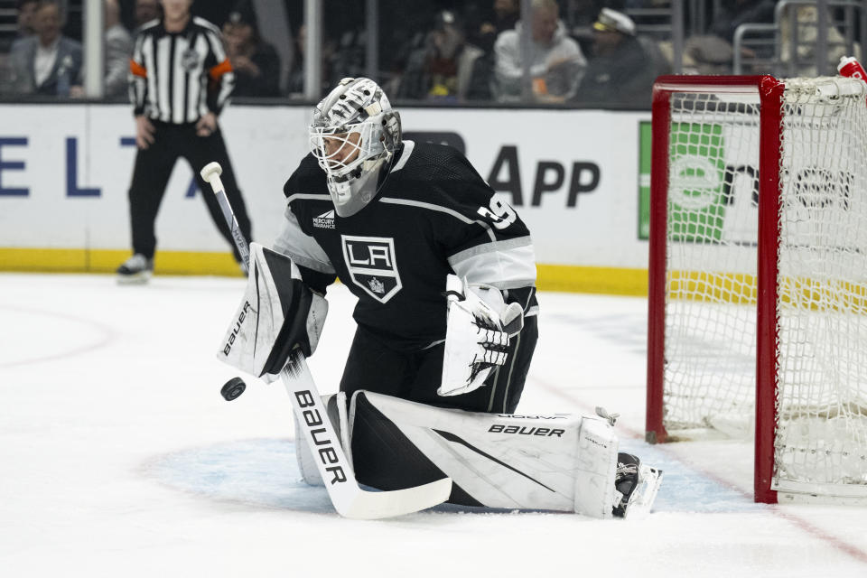 Los Angeles Kings goaltender Cam Talbot (39) blocks a shot during the first period of an NHL hockey game against the Minnesota Wild, Monday, April 15, 2024, in Los Angeles. (AP Photo/Kyusung Gong)