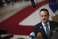 Irish Prime Minister Leo Varadkar speaks with the media as he arrives for an EU summit in Brussels, Friday, Dec. 13, 2019. European Union leaders are gathering Friday to discuss Britain's departure from the bloc amid some relief that Prime Minister Boris Johnson has secured an election majority that should allow him to push the Brexit deal through parliament. (AP Photo/Francisco Seco)