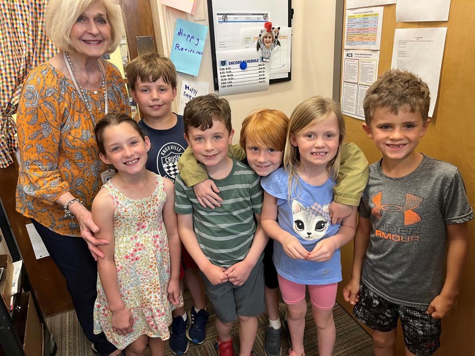 Retiring Bearden Elementary pincipal Susan Dunlap is pictured with some first graders on May 9, 2023, in her office. From left are Lucy Ashe, Mickey Bernier, Justus Kerr, Rhett Kunz, Liv Bailey and Charles Carini. These children said they liked Dunlap because she is nice, cheers people up and loves UT sports.