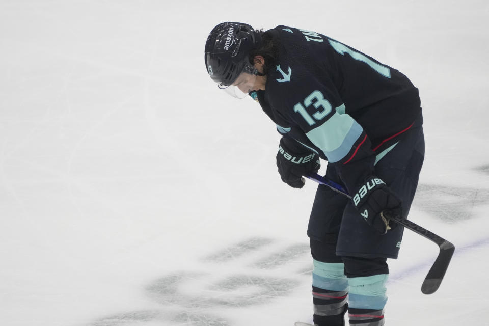 Seattle Kraken left wing Brandon Tanev looks down as his team trails the Buffalo Sabres during the third period of an NHL hockey game Monday, March 18, 2024, in Seattle. The Sabres won 6-2. (AP Photo/Lindsey Wasson)