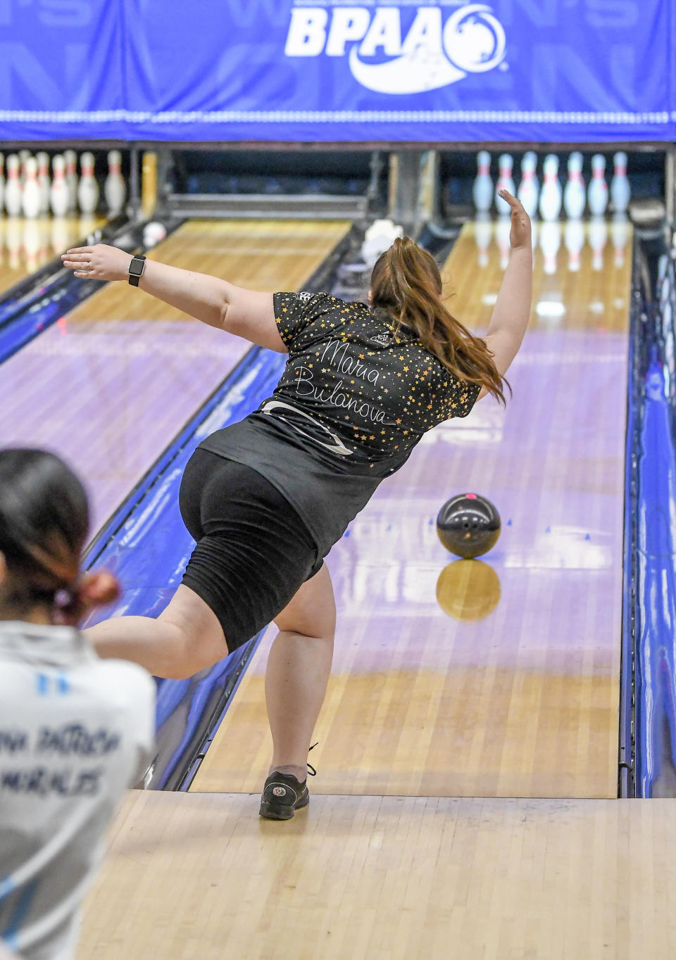 Maria Bulanova, from Russia, practices at Kingpin's Alley and Family Center, Wednesday, June 15, 2022, in Glens Falls, N.Y. Bulanova helped Vanderbilt win its second national championship in women’s bowling in 2018. (AP Photo/Hans Pennink)