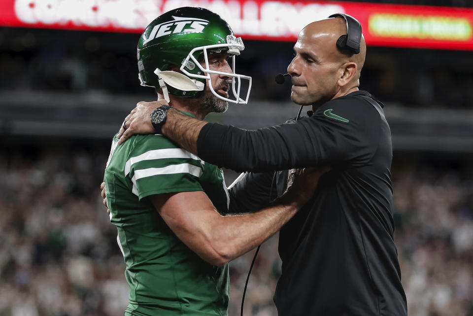 At least one disagreement between Aaron Rodgers and Robert Saleh spilled into public view this season. (AP Photo/Adam Hunger)