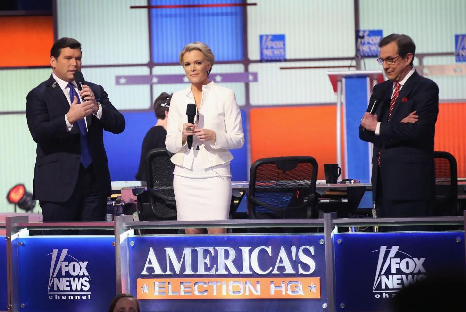 Moderators (Lto R) Bret Baier, Megyn Kelly and Chris Wallace are introduced at the Republican presidential debate sponsored by Fox News at the Fox Theatre on March 3, 2016 in Detroit, Michigan (Photo by Scott Olson/Getty Images)