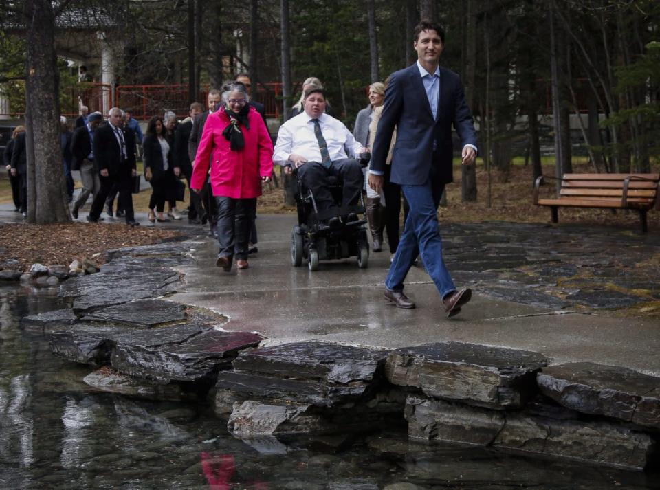 Prime Minister Justin Trudeau leads his cabinet to a meeting at a Liberal Party cabinet retreat in Kananaskis, Alta., Sunday, April 24, 2016. THE CANADIAN PRESS/Jeff McIntosh