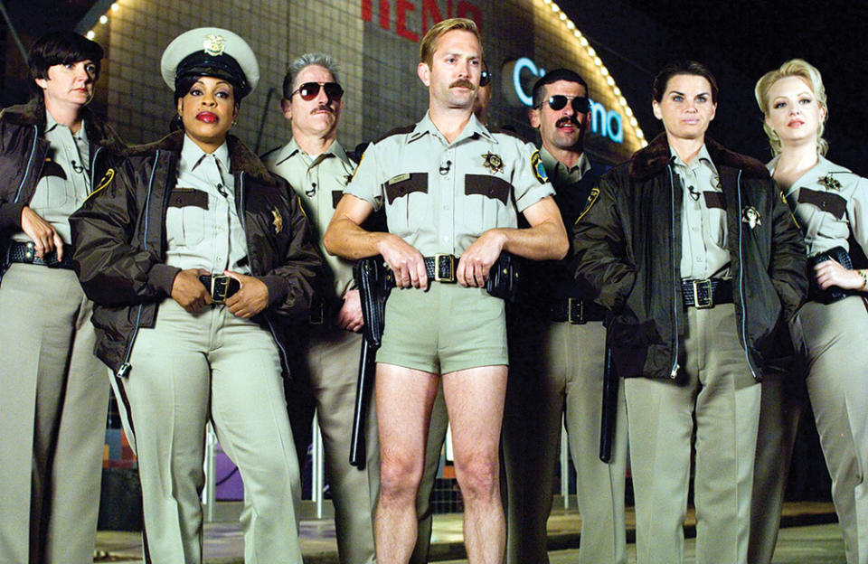 Nash-Betts (second from left) with the cast of Reno 911!