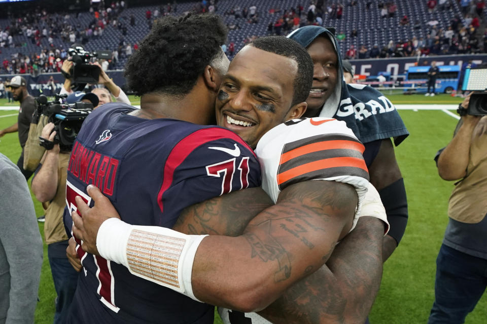 Cleveland Browns quarterback Deshaun Watson is congratulated by Houston Texans offensive tackle Tytus Howard (71) after their NFL football game between the Cleveland Browns and Houston Texans in Houston, Sunday, Dec. 4, 2022. (AP Photo/Eric Gay)