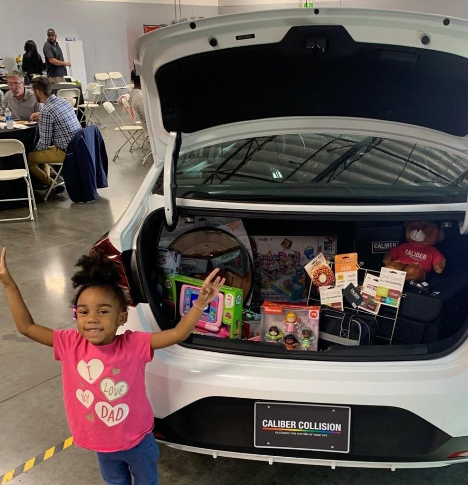 Genesis, Isaac Taylor's daughter. Taylor previously biked 16 miles to and from work. In September 2023, he was given a car as part of the Recycled Rides program.