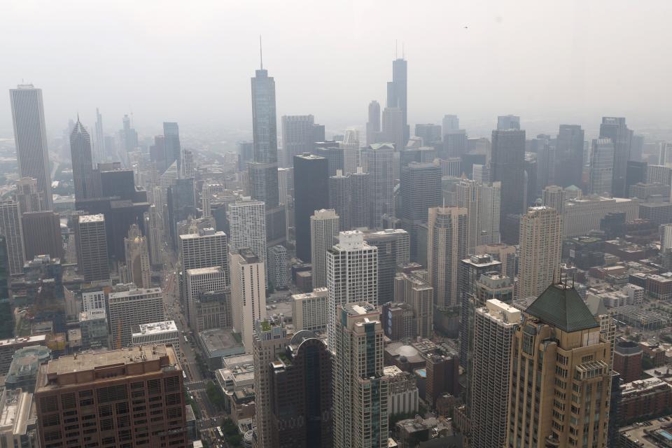 Wildfire smoke obscures the view from the Signature Lounge on the  96th floor of the former John Hancock Building on North Michigan Ave on June 29, 2023 in Chicago, Illinois.