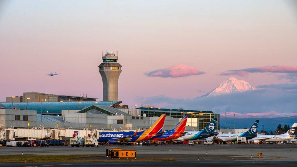 Portland International Airport at sunrise with mountain peak