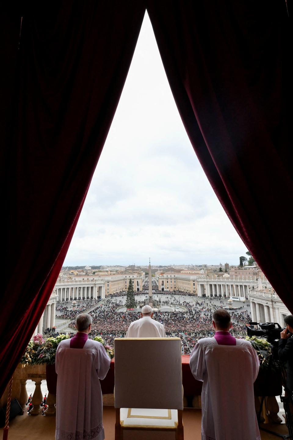 This photo taken on Dec. 25, 2023 by The Vatican Media shows Pope Francis during the Christmas Urbi et Orbi blessing in The Vatican.