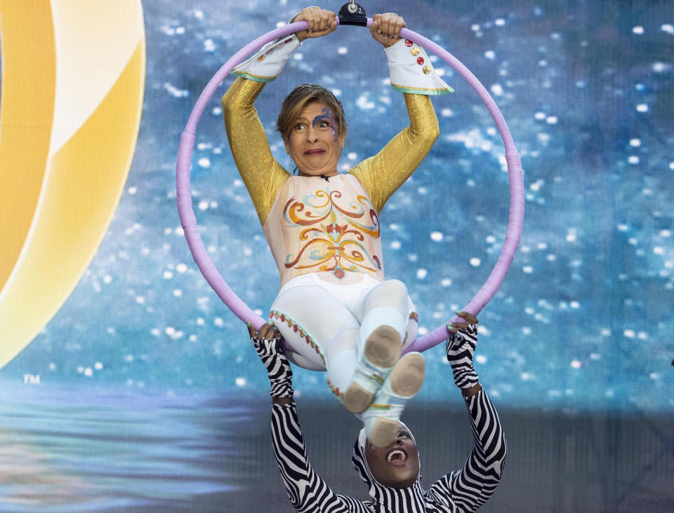 Hoda Kotb and Savannah Guthrie are Cirque Du Soleil acrobats during the TODAY show Halloween reveal on Oct. 31, 2022.