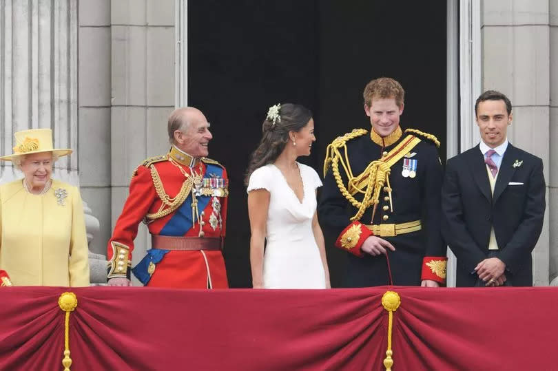 prince harry on balcony with queen elizabeth, prince philip, pippa middleton and james middleton